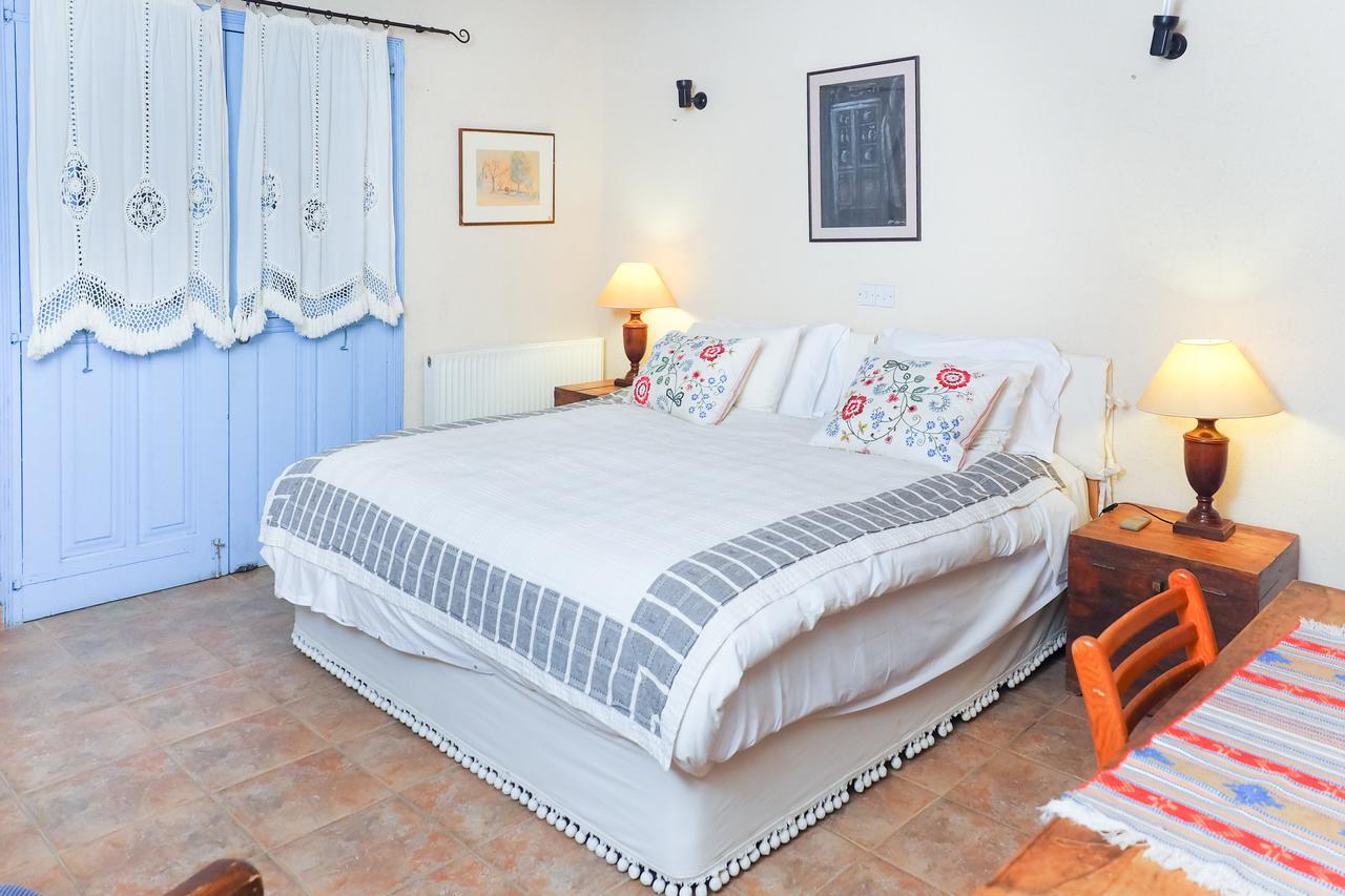 Adamos Hotel Apartments Tóhni Kültér fotó